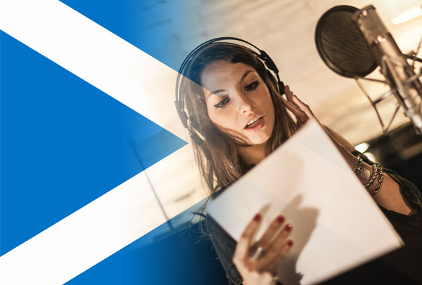 Scottish flag and voice-over artist recording with accent