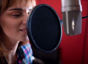 Lady recording a dubbed voice over